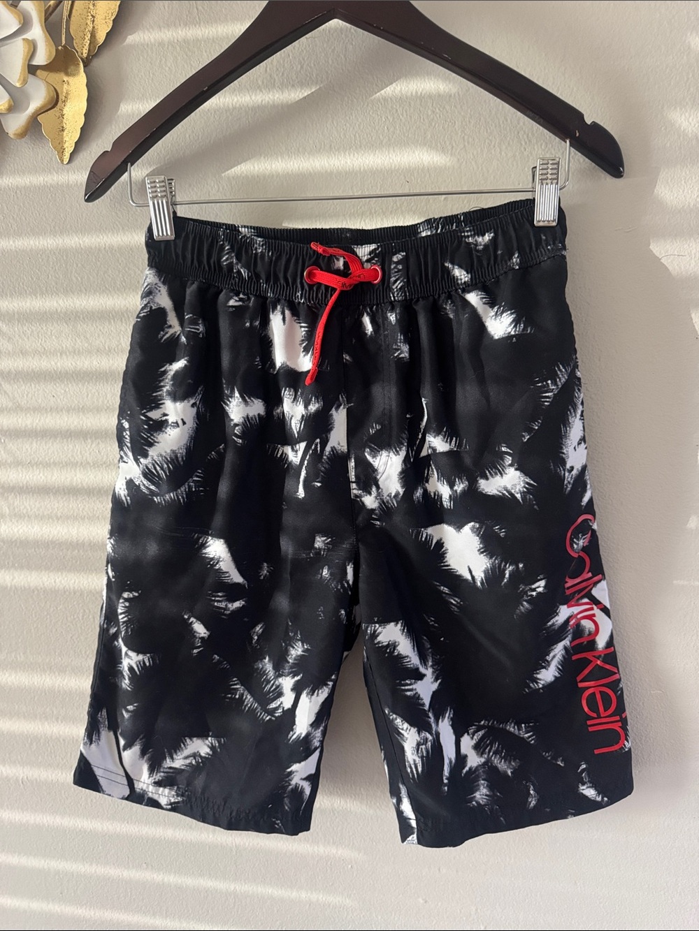 Calvin Klein Black & White Palm-Print Swim Trunks with Red Accents